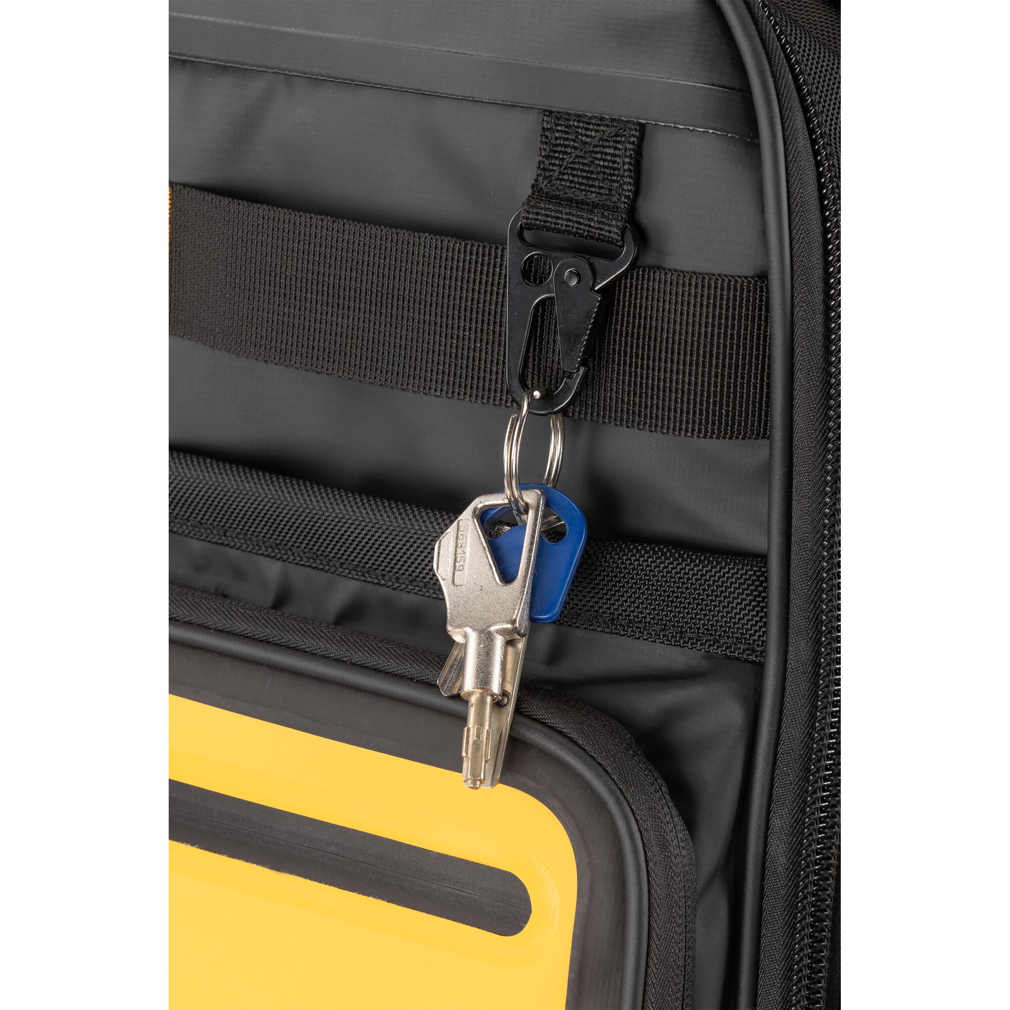 Wallet being placed into external pcoket of the Dewalt Pro Backpack