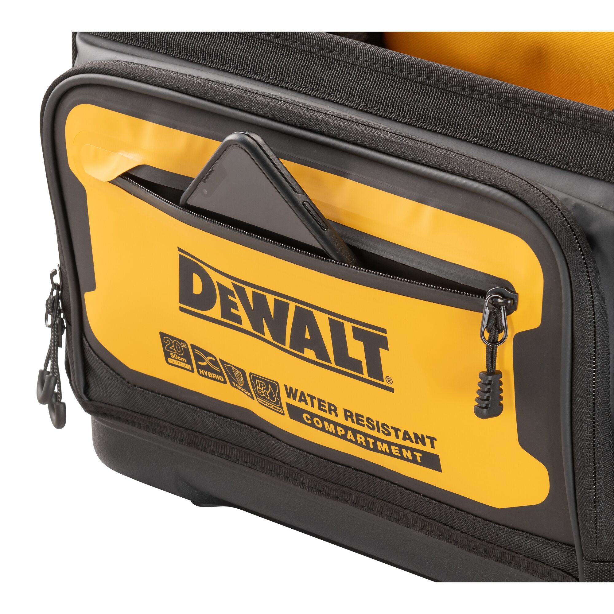 Close up of a mobile phone being slotted into the water resistant compartment on the Dewalt 20" Pro Tool Tote"