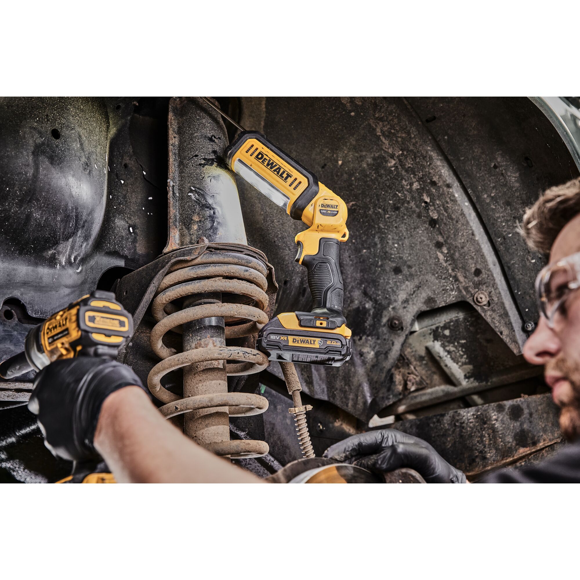 LED hand held area light being used by a person